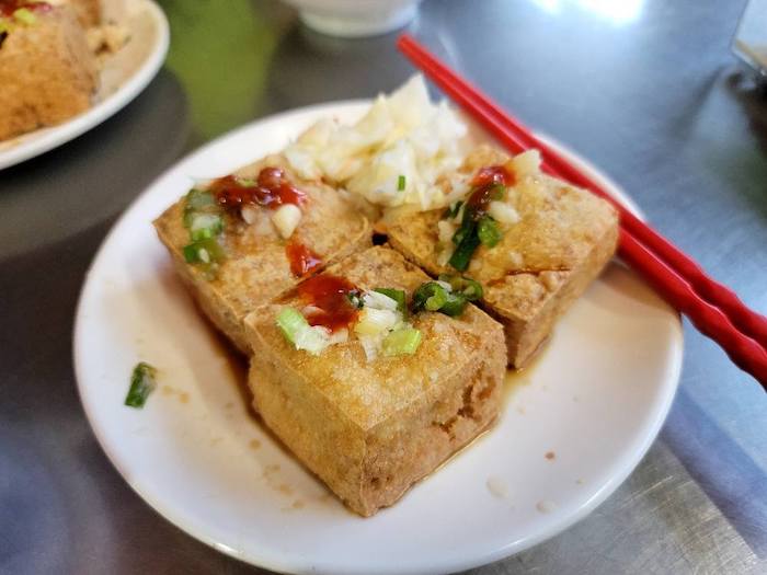 簡老闆牽漿臭豆腐